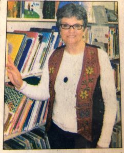 Carol Ann Engskov in library in 2011